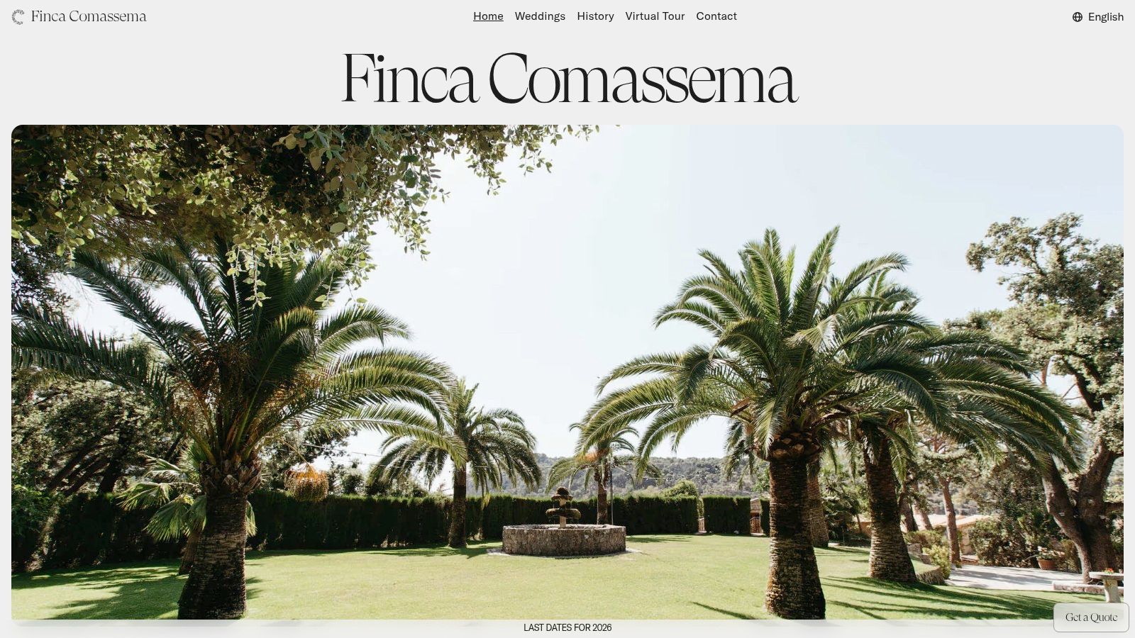 The grand stone-paved 'Clastra' courtyard at Finca Comassema, set for a wedding reception in Mallorca.